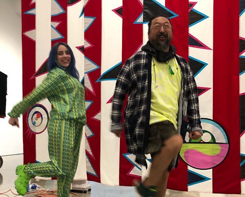 Billie Eilish and Takashi Murakami presenting a Uniqlo t-shirt collaboration
